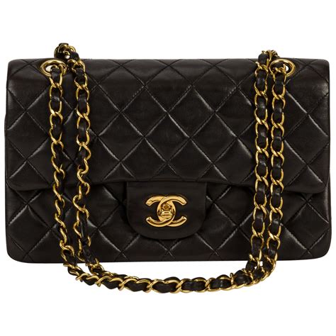 chanel purse black and gold|black and gold chanel bag.